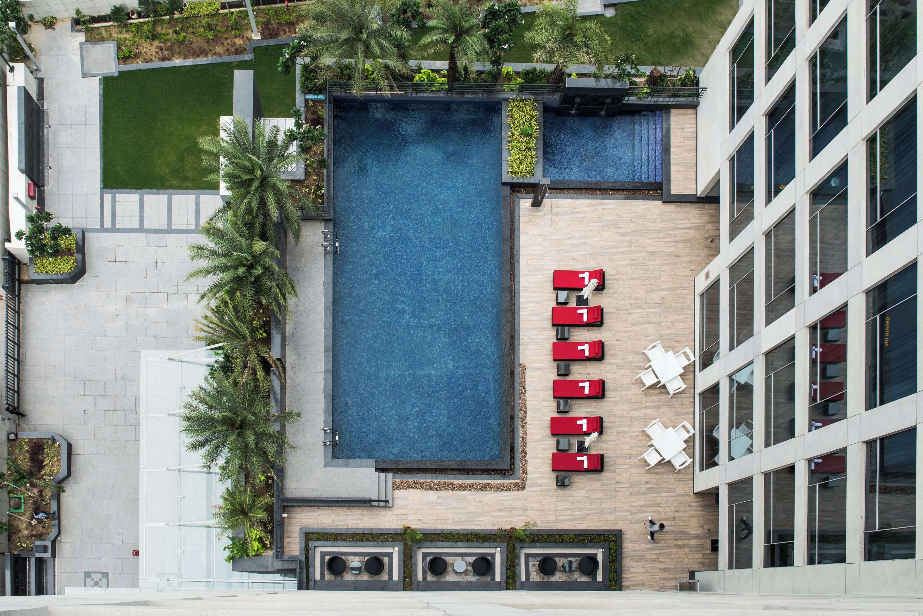Outdoor pool, free pool cabanas, pool umbrellas