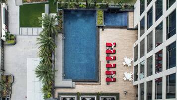 Outdoor pool, free pool cabanas, pool umbrellas