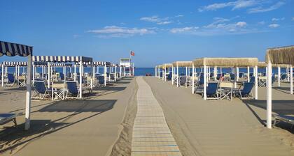 Cypress farmhouse in the park, sea and city of art