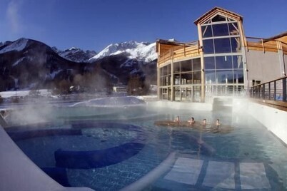 Typical and south-facing ground floor apartment close to the trails and stores