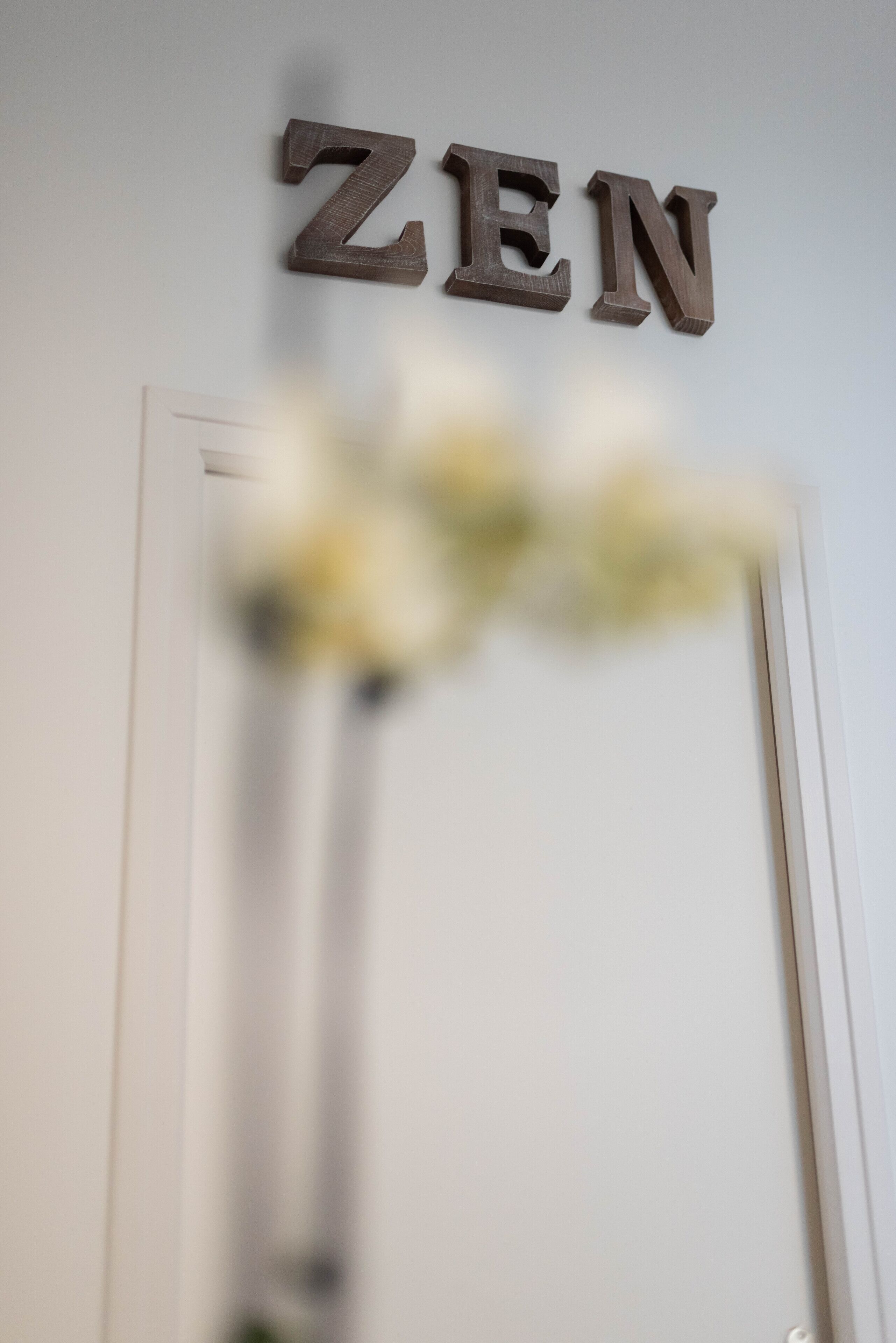 A wall with the word "ZEN" in large letters.