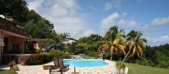 between the sea and the Caribbean sun garden