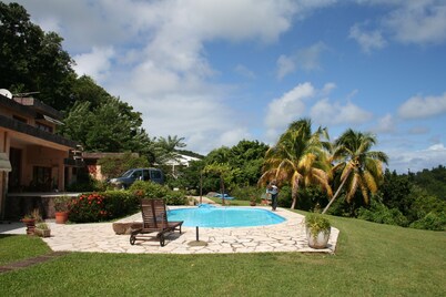 between the sea and the Caribbean sun garden