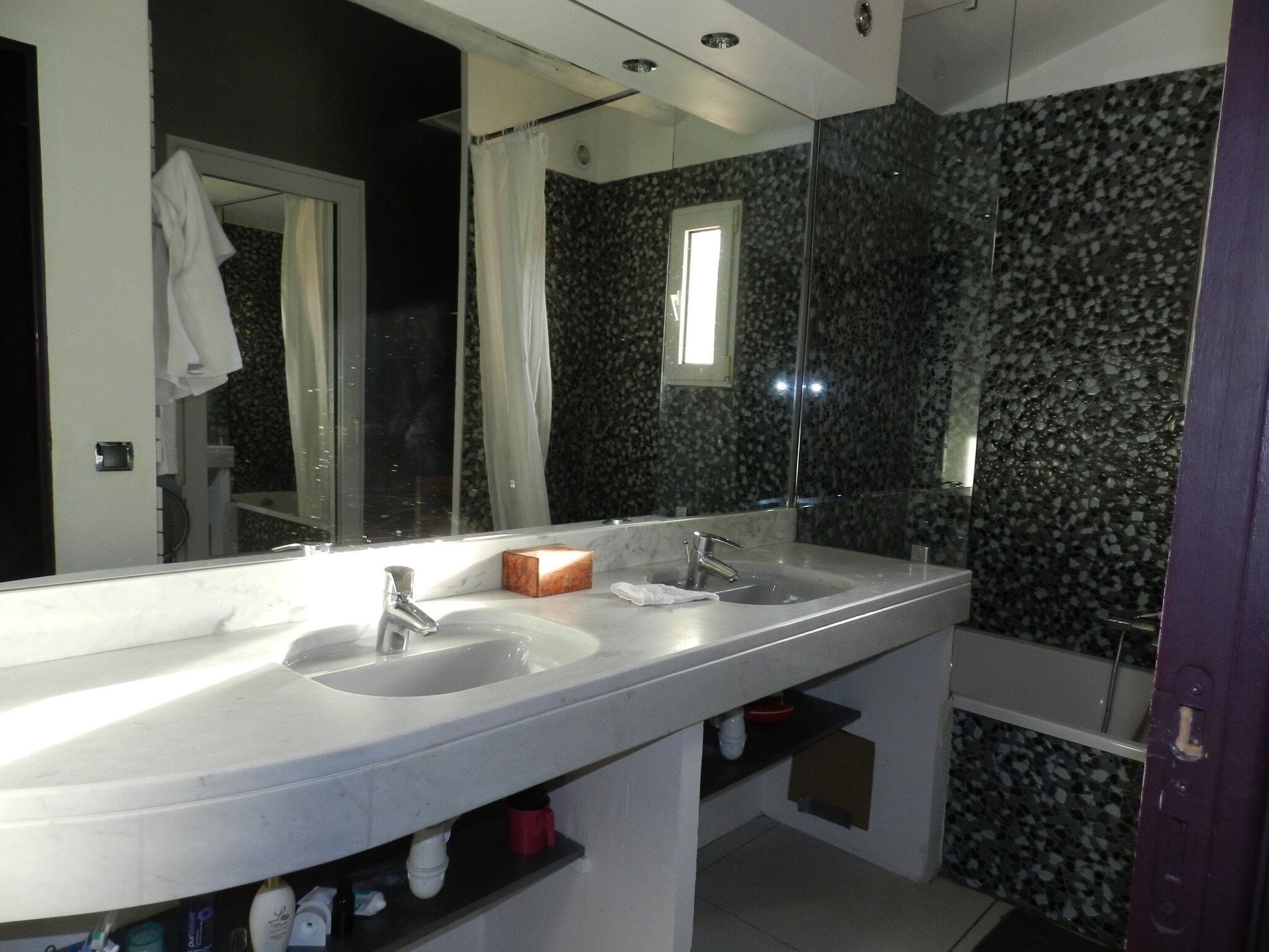 Bathtub, hair dryer, towels