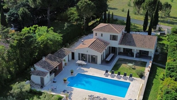 A large, modern house with a swimming pool, surrounded by lush greenery and trees. - 2 DUPLEX   1 STUDIO IN A WONDERFUL AND PEACEFUL PLACE (Maubec)