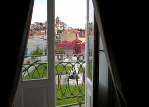 Enjoy the city view from your balcony overlooking the urban landscape.