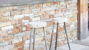 A stone bar with stools, a wooden ceiling, and a brick wall. - Villa Angel - Panoramic view with magnificent swimming pool and pool house (La Gaude)