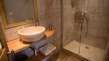 Shower, eco-friendly toiletries, hair dryer, towels