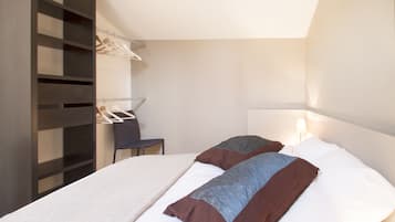 1 dormitorio, tabla de planchar con plancha, wifi gratis y ropa de cama