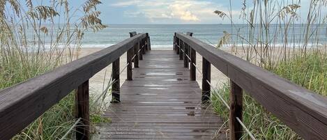 On the beach, sun loungers, beach towels