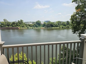 Enjoy serene lakeside views from this peaceful balcony, perfect for relaxation and taking in the surrounding natural beauty.