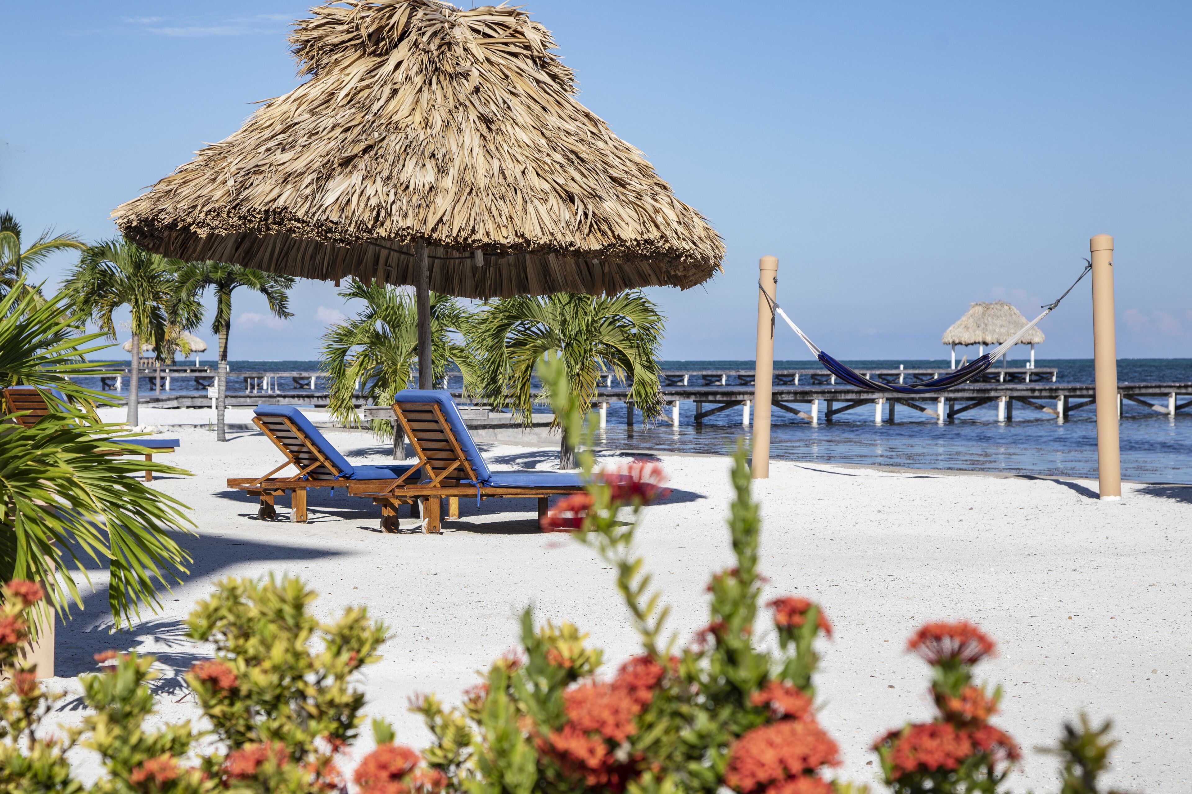 On the beach, sun loungers, beach towels