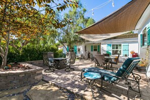 PRIVATE FRONT PATIO WITH LOTS OF SEATING 