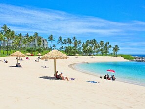 On the beach, sun loungers, beach towels