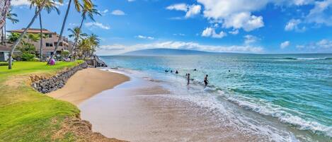 On the beach, sun loungers, beach towels