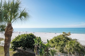 On the beach, sun loungers, beach towels