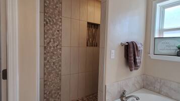 Combined shower/tub, hair dryer, towels, soap