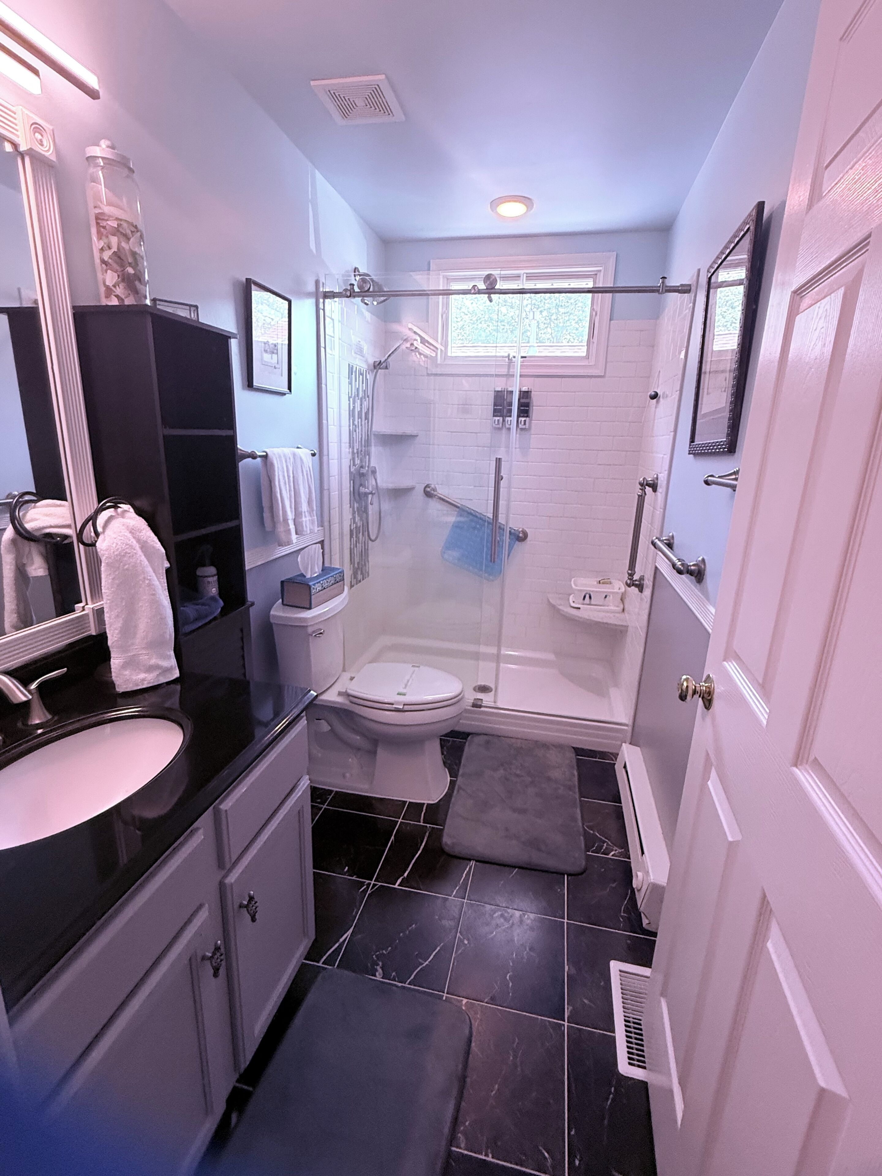 Shower, eco-friendly toiletries, hair dryer, towels
