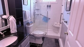 Shower, eco-friendly toiletries, hair dryer, towels