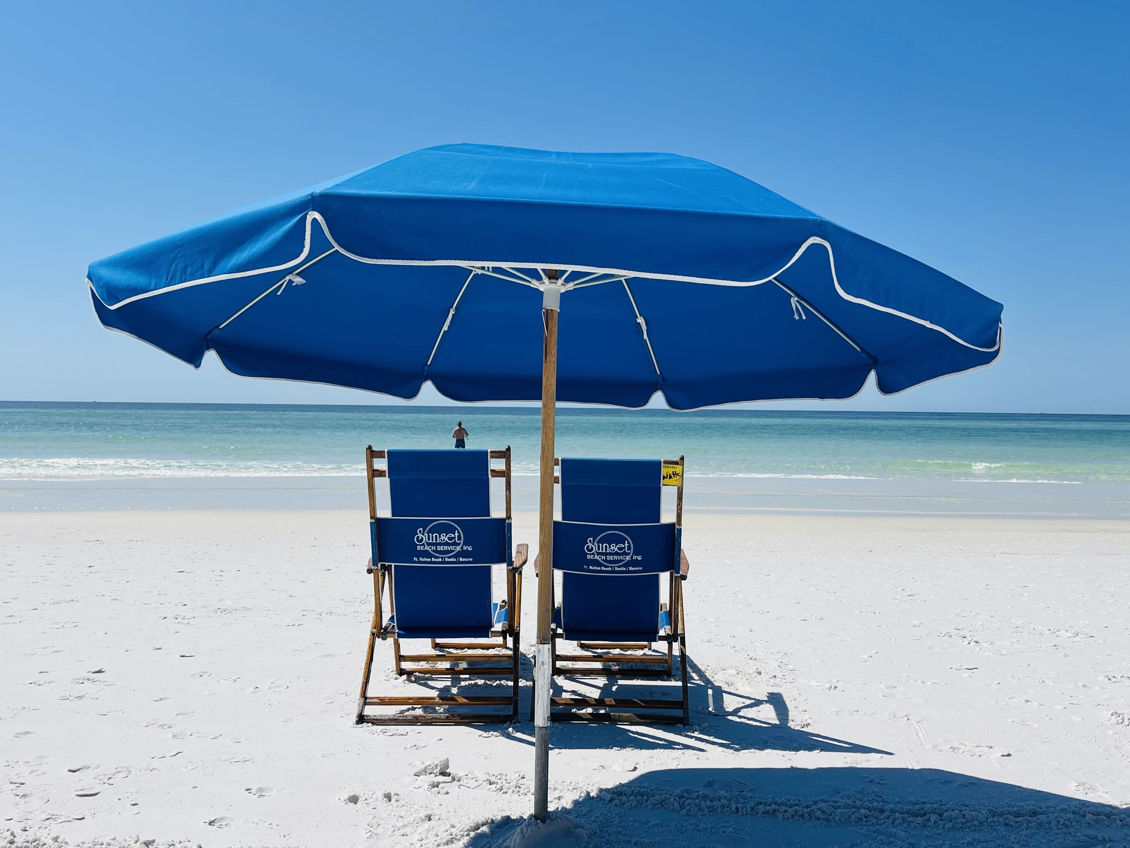 On the beach, sun loungers, beach towels