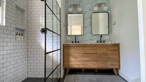 Combined shower/tub, hair dryer, towels, soap