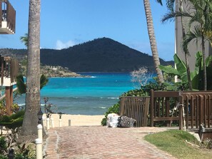 On the beach, sun loungers, beach towels