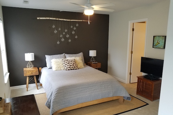 Primary - Queen Bed, Bathroom Ensuite, Walk-In Closet w/ Crib, 32” TV