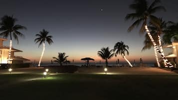On the beach, sun loungers, beach towels