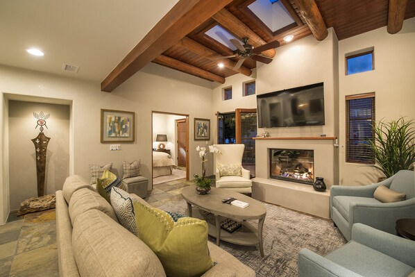 Smart TV, fireplace, books