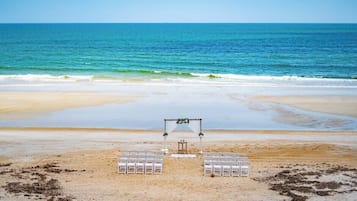 On the beach, sun loungers