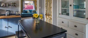 We have A/C! Relax in the hot tub! modern design, family and pet friendly!