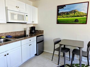 Fridge, microwave, stovetop, coffee/tea maker
