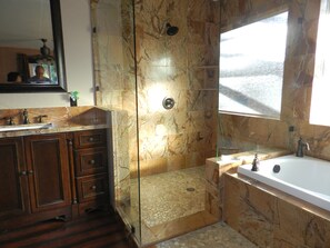 Bathtub, jetted tub, hair dryer, towels