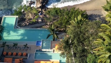 On the beach, sun-loungers, beach towels