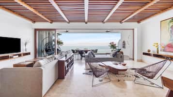 Smart TV, fireplace, books, stereo