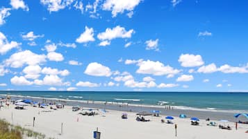 On the beach, sun loungers, beach towels