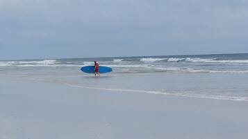 On the beach, sun-loungers, beach towels