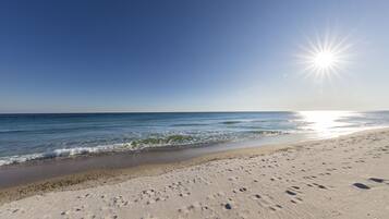 On the beach, sun loungers, beach towels