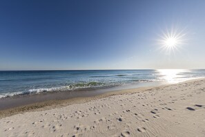On the beach, sun loungers, beach towels