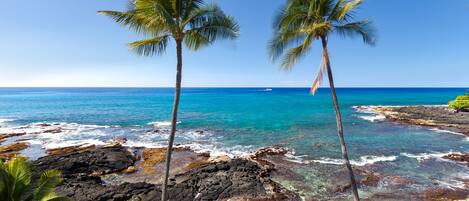 On the beach, sun loungers, beach towels