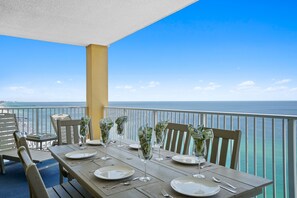 Outdoor dining - BEACHFRONT Panoramic Corner Unit, Beach Service, Wifi, free parking, Sleeps 6! (Panama City Beach)
