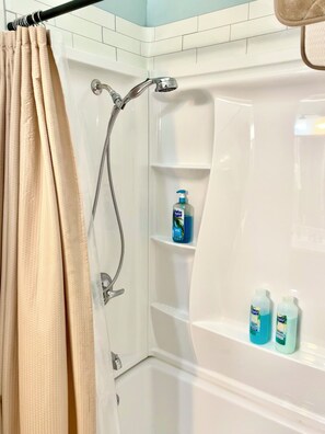 Combined shower/bathtub, hair dryer, towels, soap - Cozy, Clean, Award Winning Private Home near Opryland Hotel & Grand Ole Opry (Nashville)