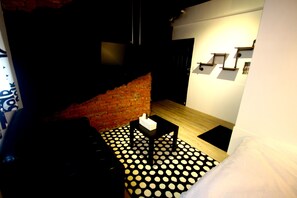 City Double Room Single Use, 1 Double Bed | Living area | Flat-screen TV