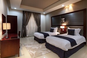 Minibar, in-room safe, blackout drapes, iron/ironing board - Intour Qurtoba Hotel Suites (Riyadh)