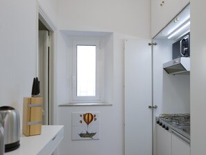 Fridge, microwave, coffee/tea maker, toaster