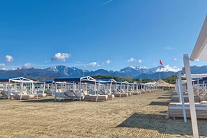 Beach nearby, sun loungers