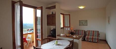 Apartment, 1 Bedroom, Terrace | In-room safe, individually decorated, individually furnished, desk