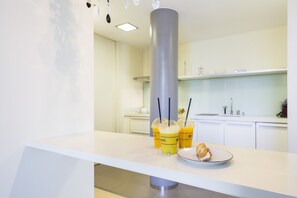 Fridge, microwave, oven, stovetop - Luxury 2 bedroom apartment on Paseo de Gracia (Barcelona)