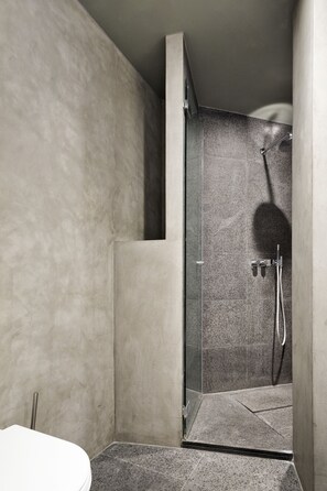 Bathtub, hair dryer, towels, soap