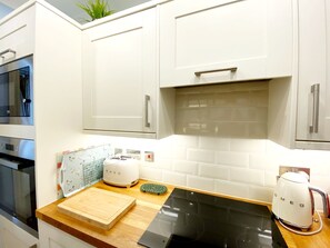 Fridge, microwave, oven, stovetop - First Floor Studio Apartment in charming historic building overlooking gardens. (Torquay)
